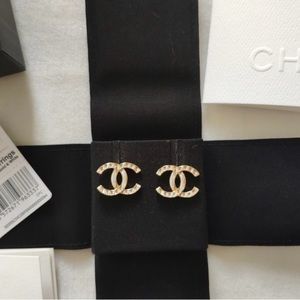 Authentic Chanel cc logo white enamel a d gold studs.